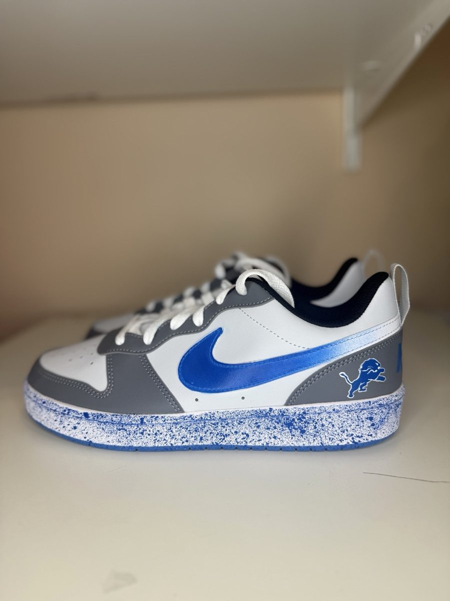 Hand-painted Lions sneakers with a blue splatter sole