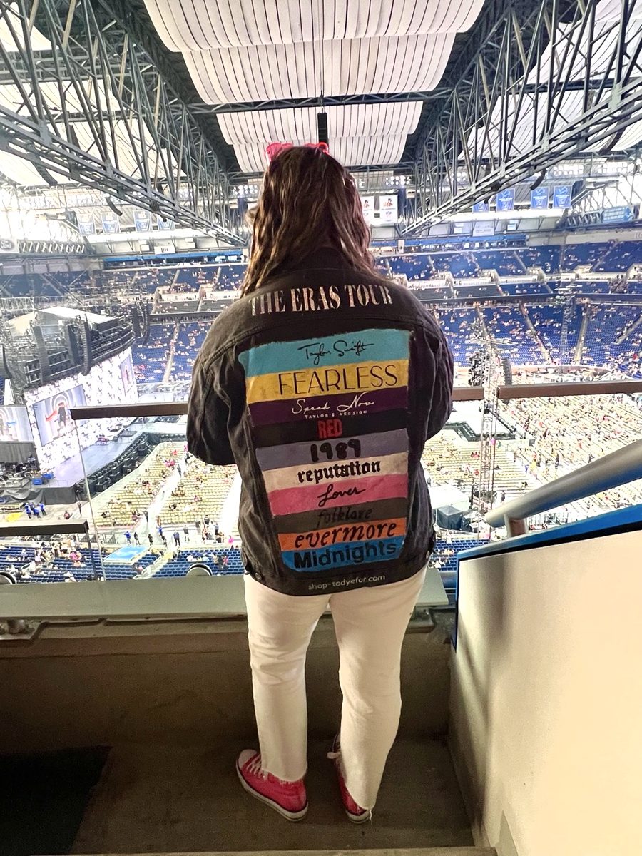 Concertgoer in a hand-painted jean jacket