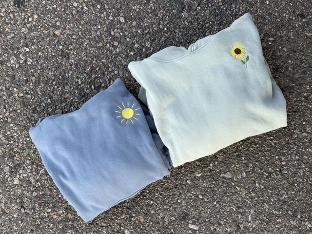 Embroidered sun and sunflower hoodies
